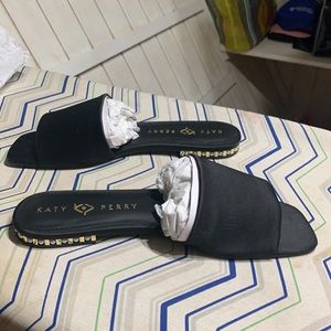 Very stylish black satin slide, pearls!  Can be dressed up or with shorts.